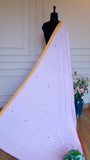 Traditional Dhonekhali handloom cotton saree displayed on a mannequin against a neutral background.
