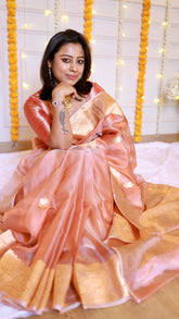 Model showcasing the full flare, delicate texture, and lightweight drape of the handloom Banarasi silk saree.