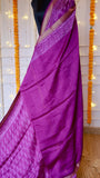 Magenta Maheshwari Silk Saree draped on a display mannequin showing the rich silk texture and woven gold zari border.