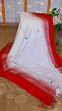 Off-white cotton Bomkai saree draped over display showcasing crimson temple border and small woven buttis