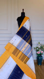 White and Navy Dhonekhali Handloom Cotton Saree with Mustard Accents