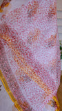 Close up view of Titafu Kota Doria Pure Cotton Saree showing detailed pink and orange Bagru handblock printed floral vine pattern.