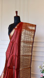 Close up shot of Crimson Red Mangalagiri Semi Silk Saree displaying detailed geometric and floral gold zari nizam border