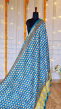 Full drape view of Cerulean Blue Maheshwari Silk Saree on mannequin showing small motif body print and contrasting yellow pallu.