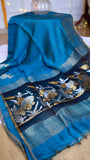 Full length display of peacock blue Pure Silk Linen Saree with intricate border and tassel finish