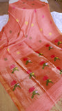 Full body drape of pure silk linen saree showcasing the contrast woven lotus pattern pallu and zari border