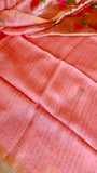 Detailed view of matching peach silk linen blouse piece fabric with woven line texture