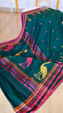 Top angle view showing the rich drape and woven tassels of the Titafu green and pink handwoven Khadi cotton saree.