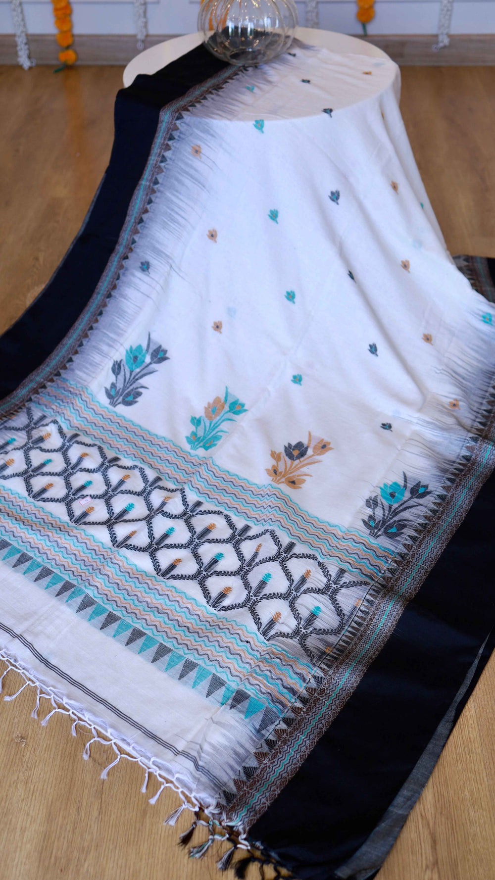 Off-White & Black Handwoven Khadi Cotton Saree with Turquoise Floral Motifs & Geometric Pallu