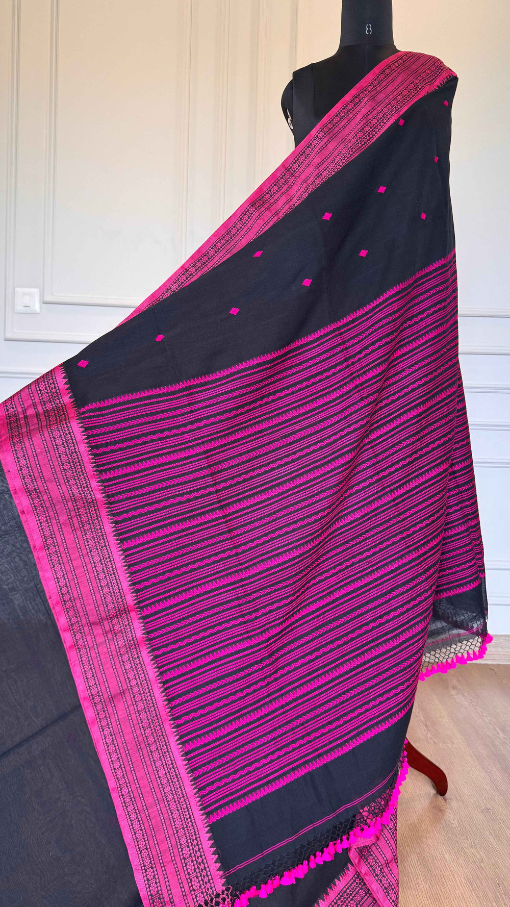 Jet Black Handloom Cotton Saree with Rani Pink Naga-Inspired Thread Work