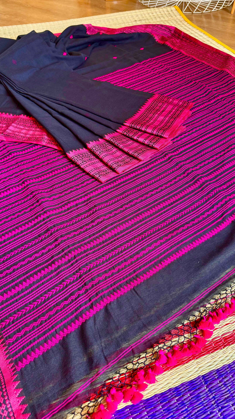 Jet Black Handloom Cotton Saree with Rani Pink Naga-Inspired Thread Work